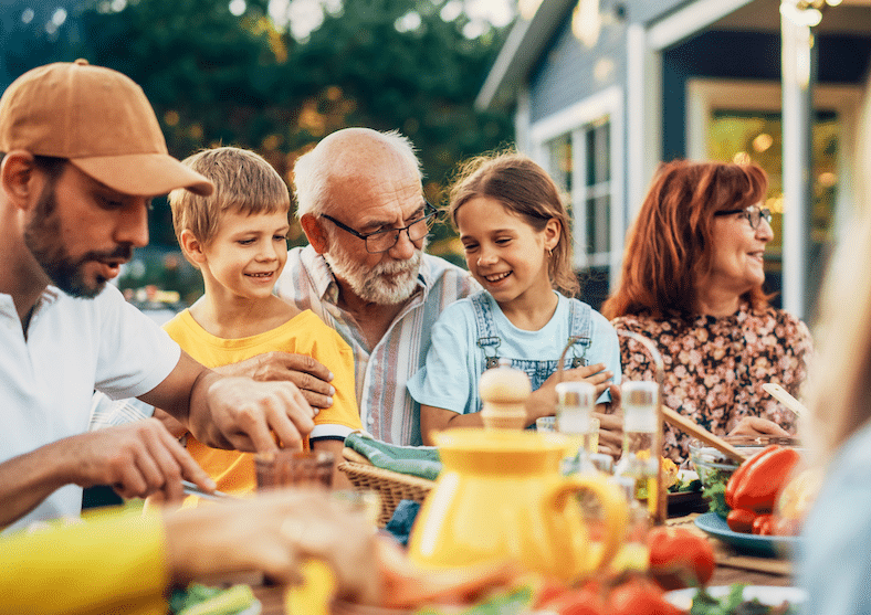 Grandparents enjoy a personal chef prepared meal with family